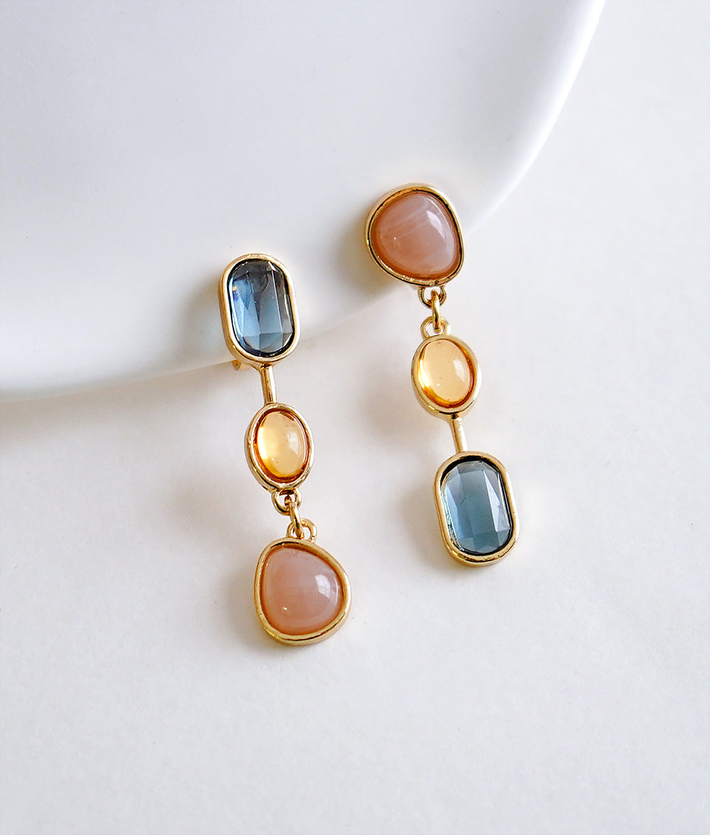 Asymmetric drop ear clip