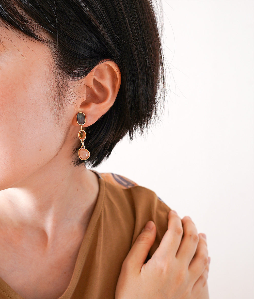 Asymmetric drop ear clip