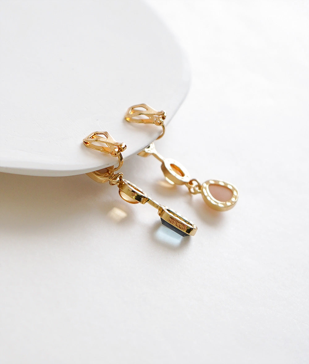 Asymmetric drop ear clip
