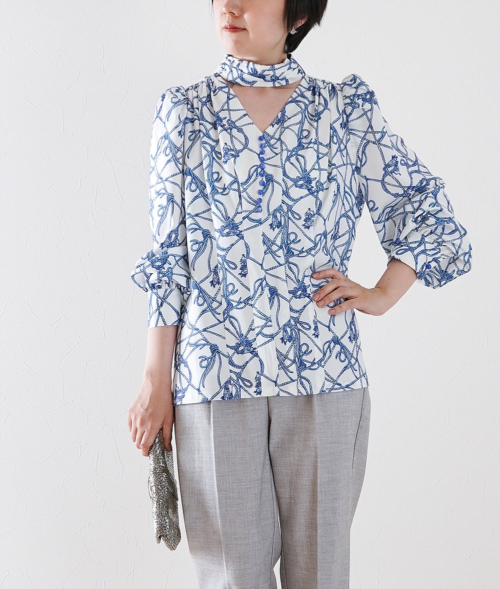 Rope-patterned puffy-sleeve blouse
