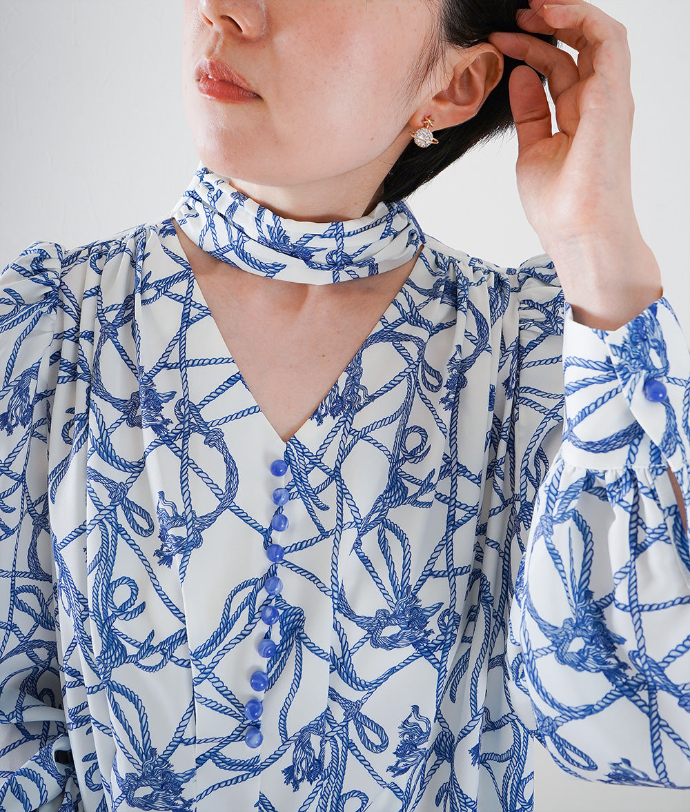 Rope-patterned puffy-sleeve blouse