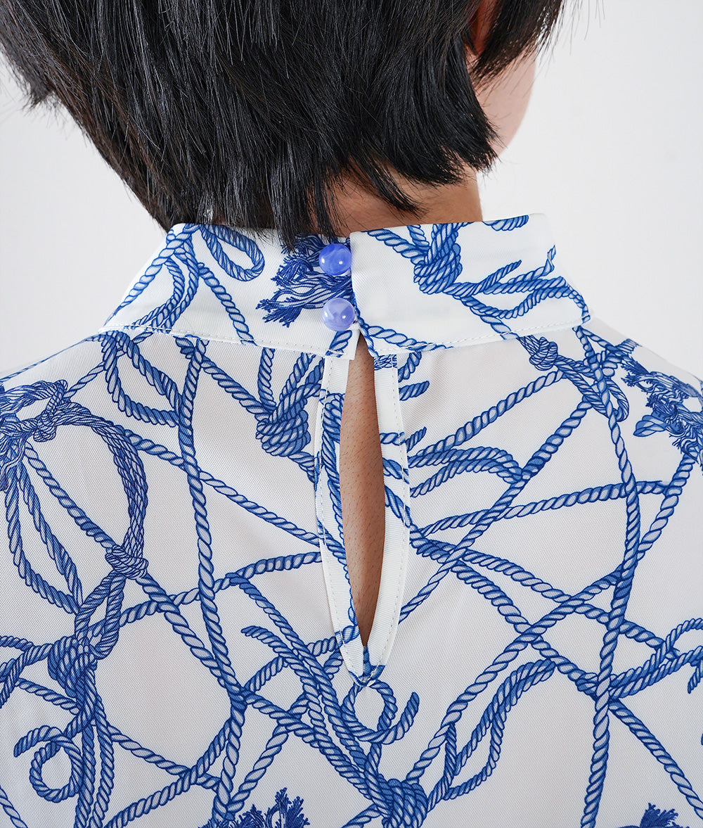 Rope-patterned puffy-sleeve blouse