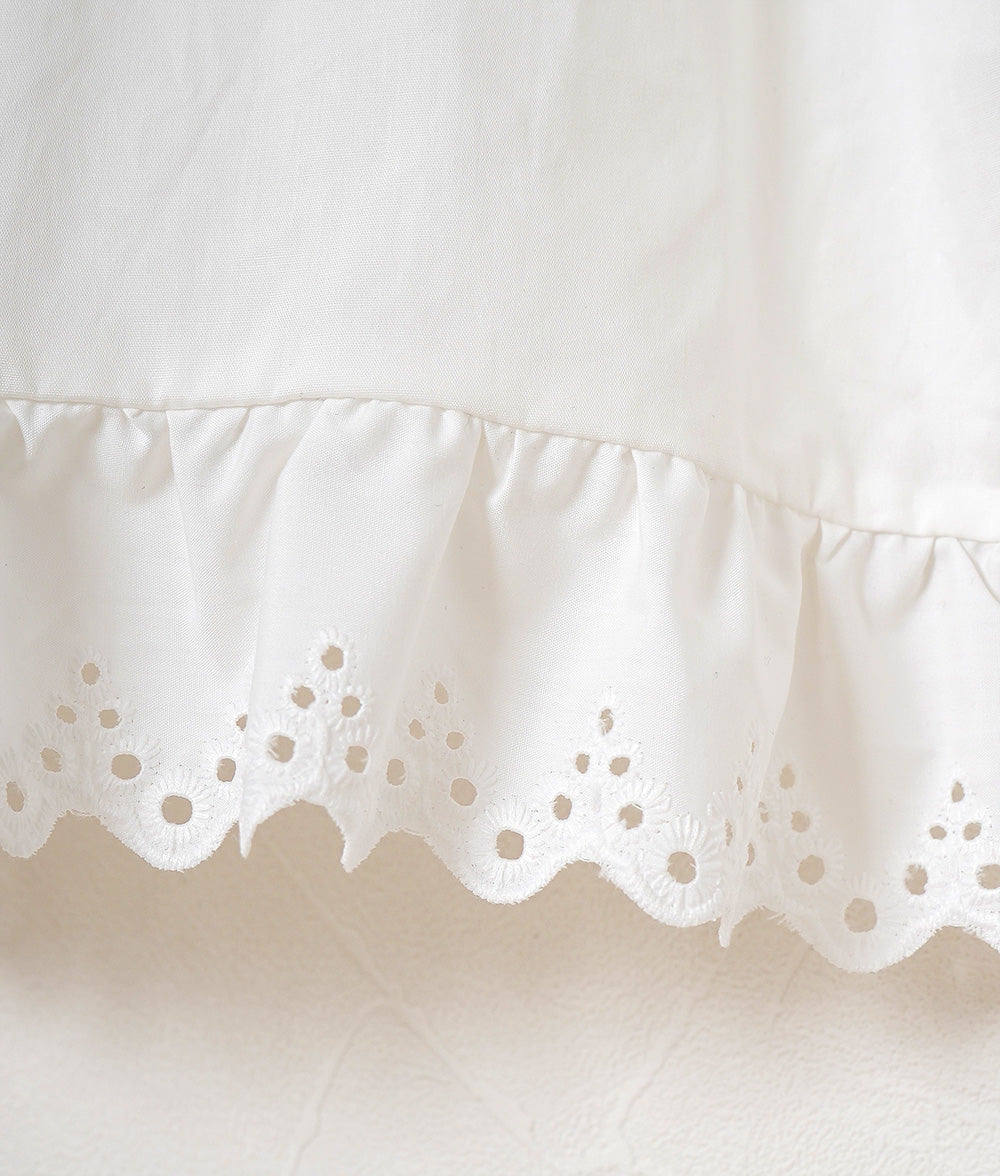 Blouse with a row of flowers