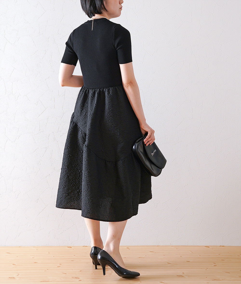 Knitted jacquard dress and pearl necklace