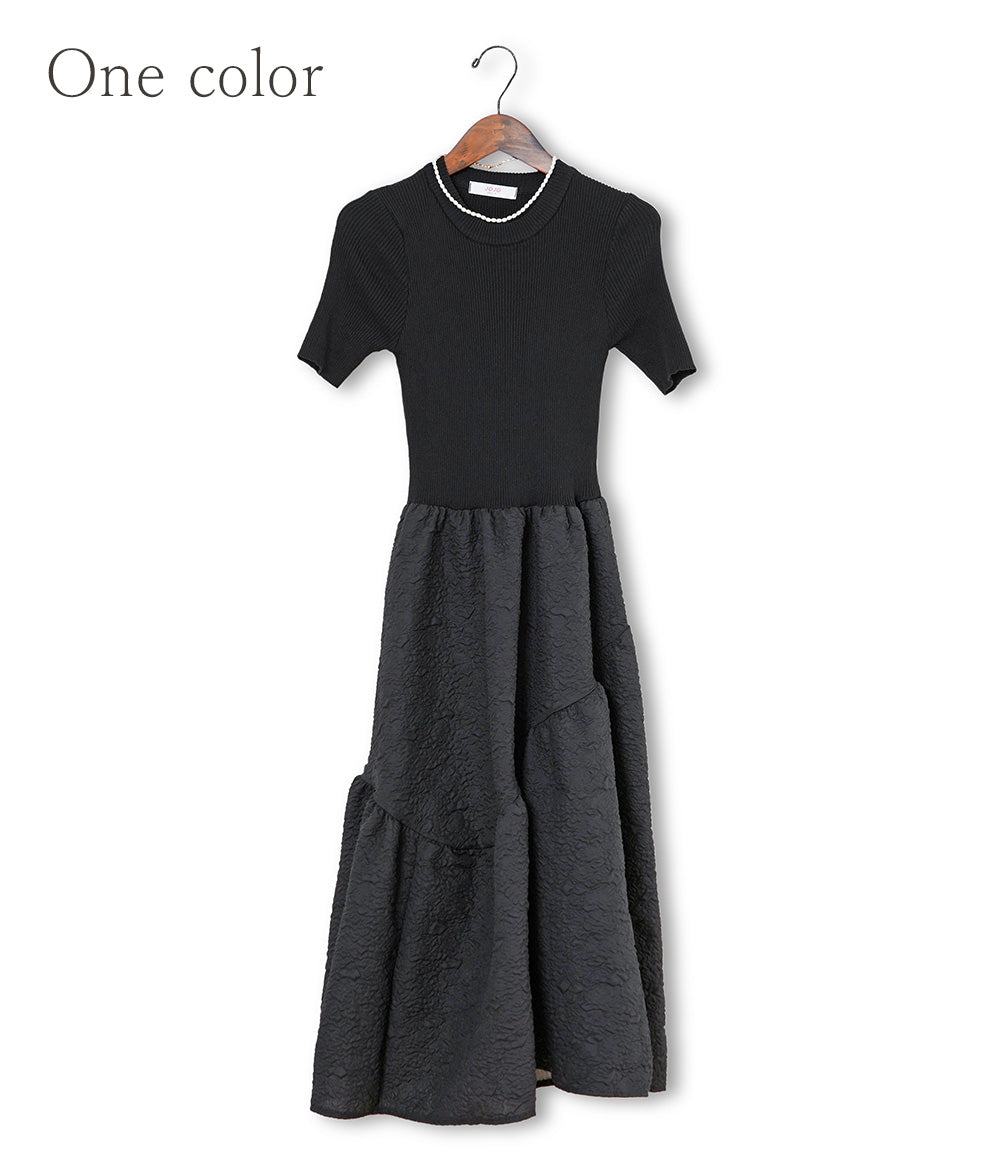 Knitted jacquard dress and pearl necklace