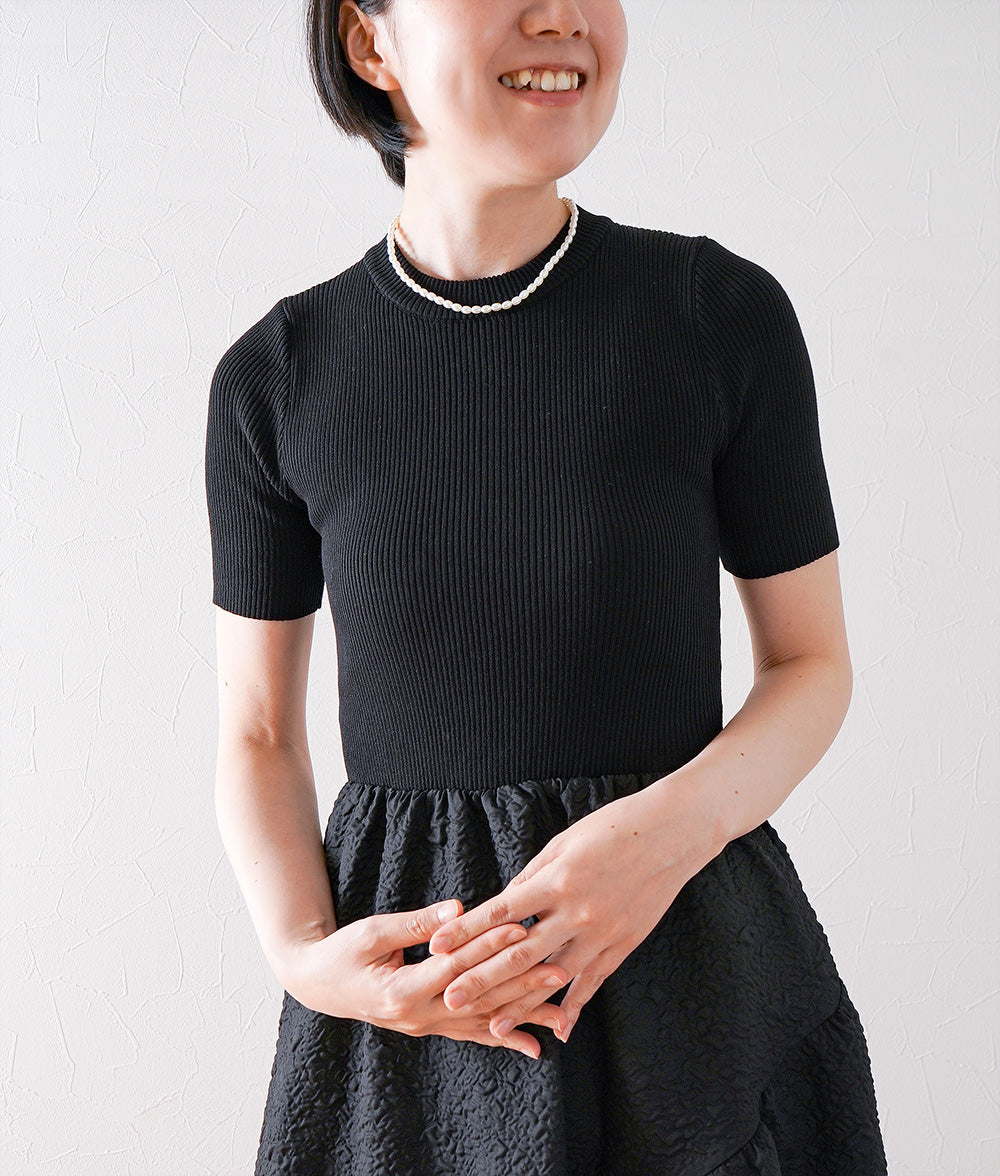 Knitted jacquard dress and pearl necklace