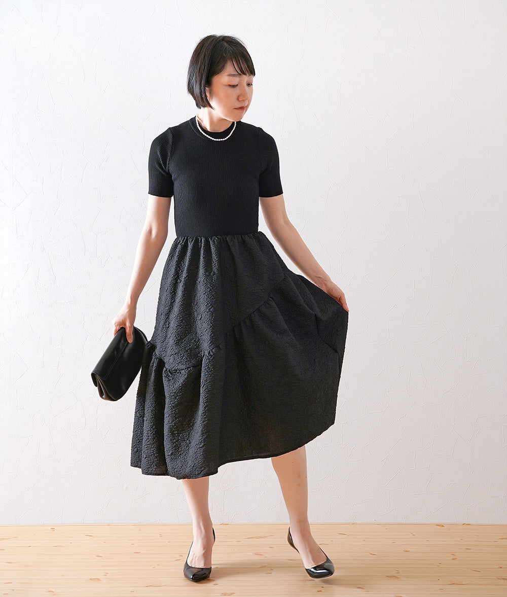 Knitted jacquard dress and pearl necklace