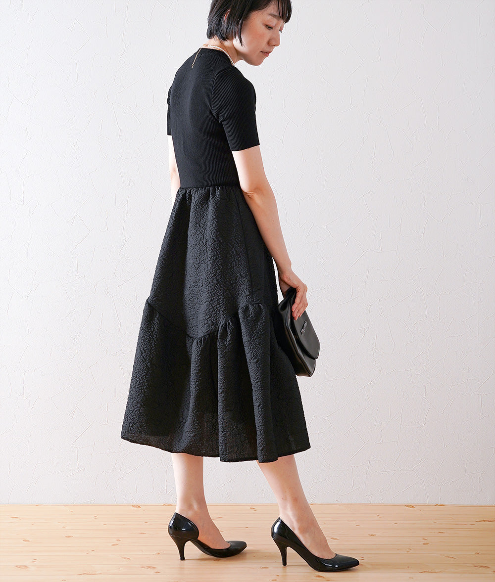 Knitted jacquard dress and pearl necklace