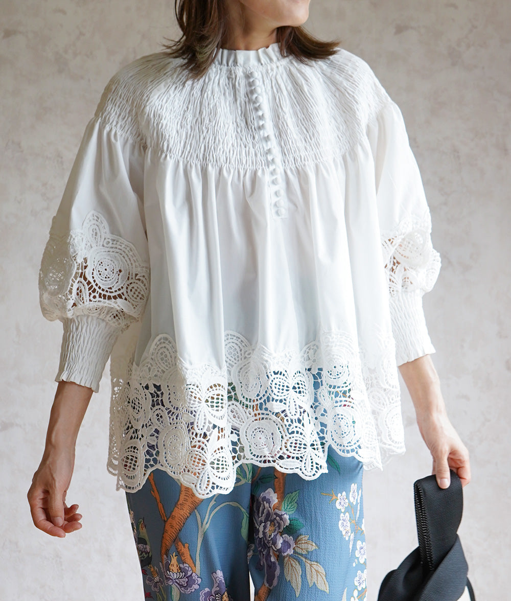 Floral lace and ruched blouse