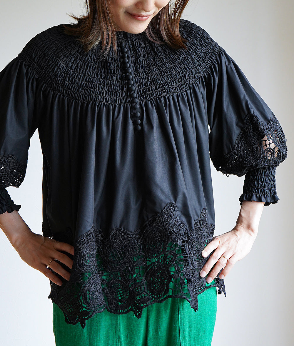 Floral lace and ruched blouse