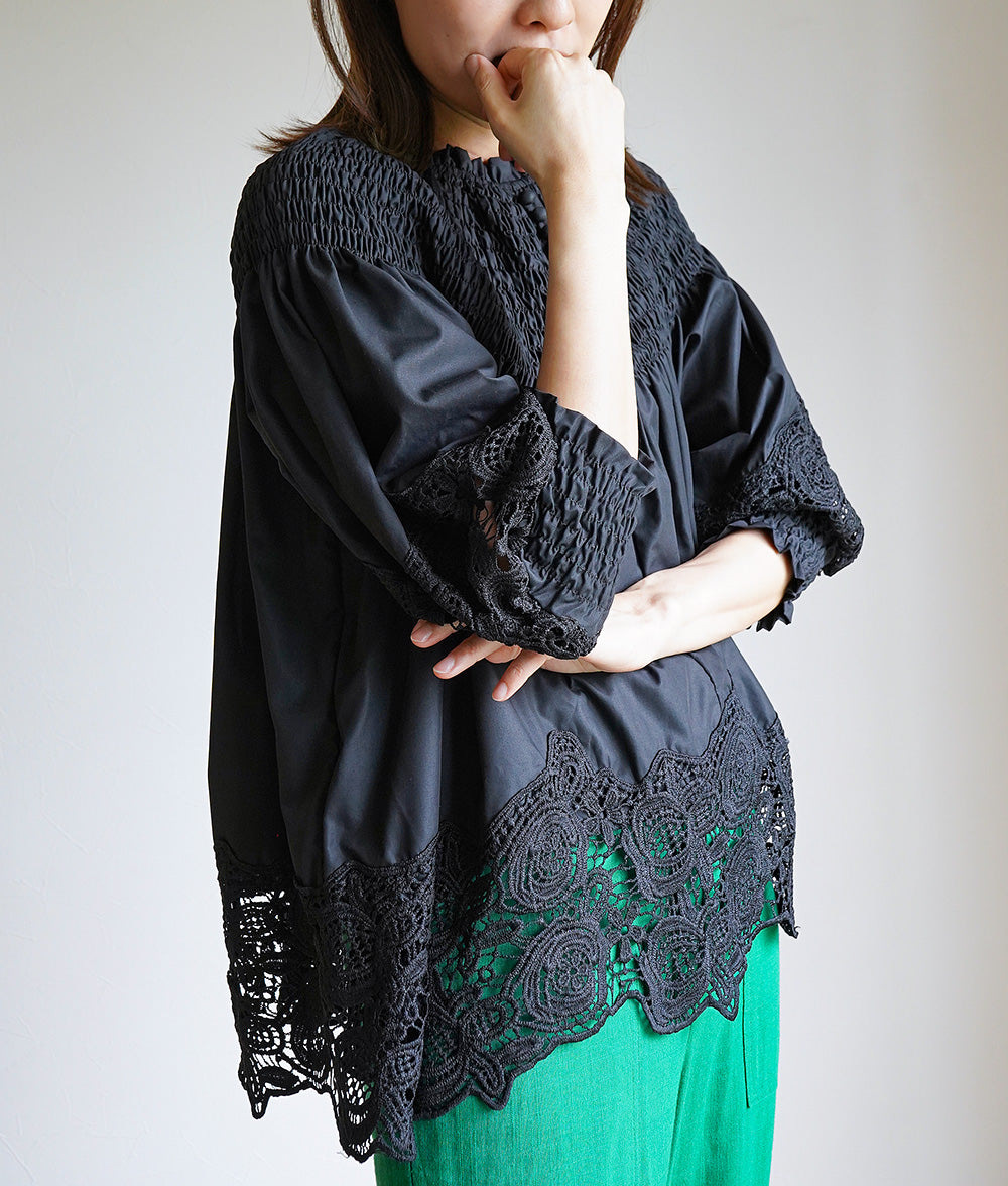 Floral lace and ruched blouse