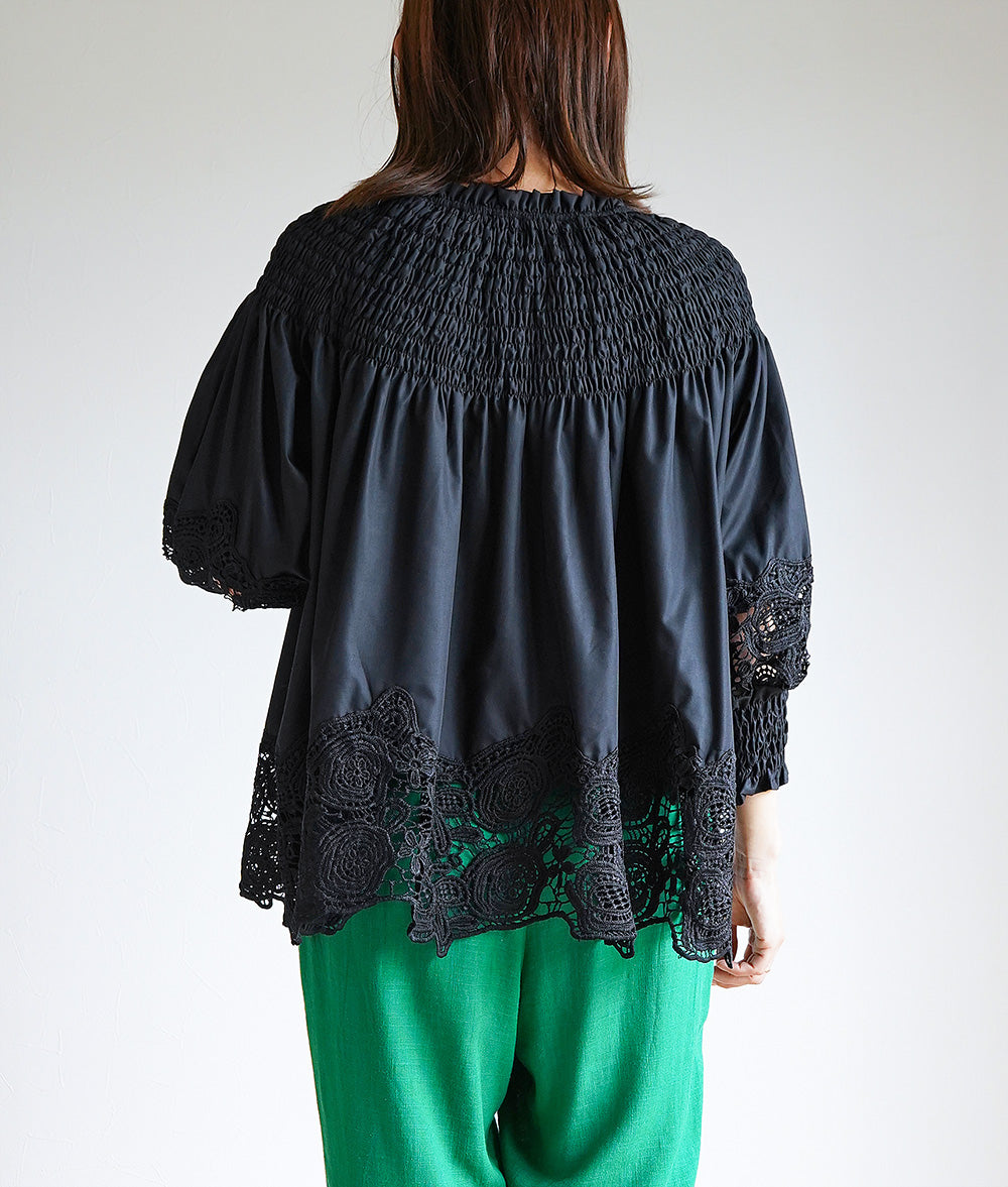 Floral lace and ruched blouse
