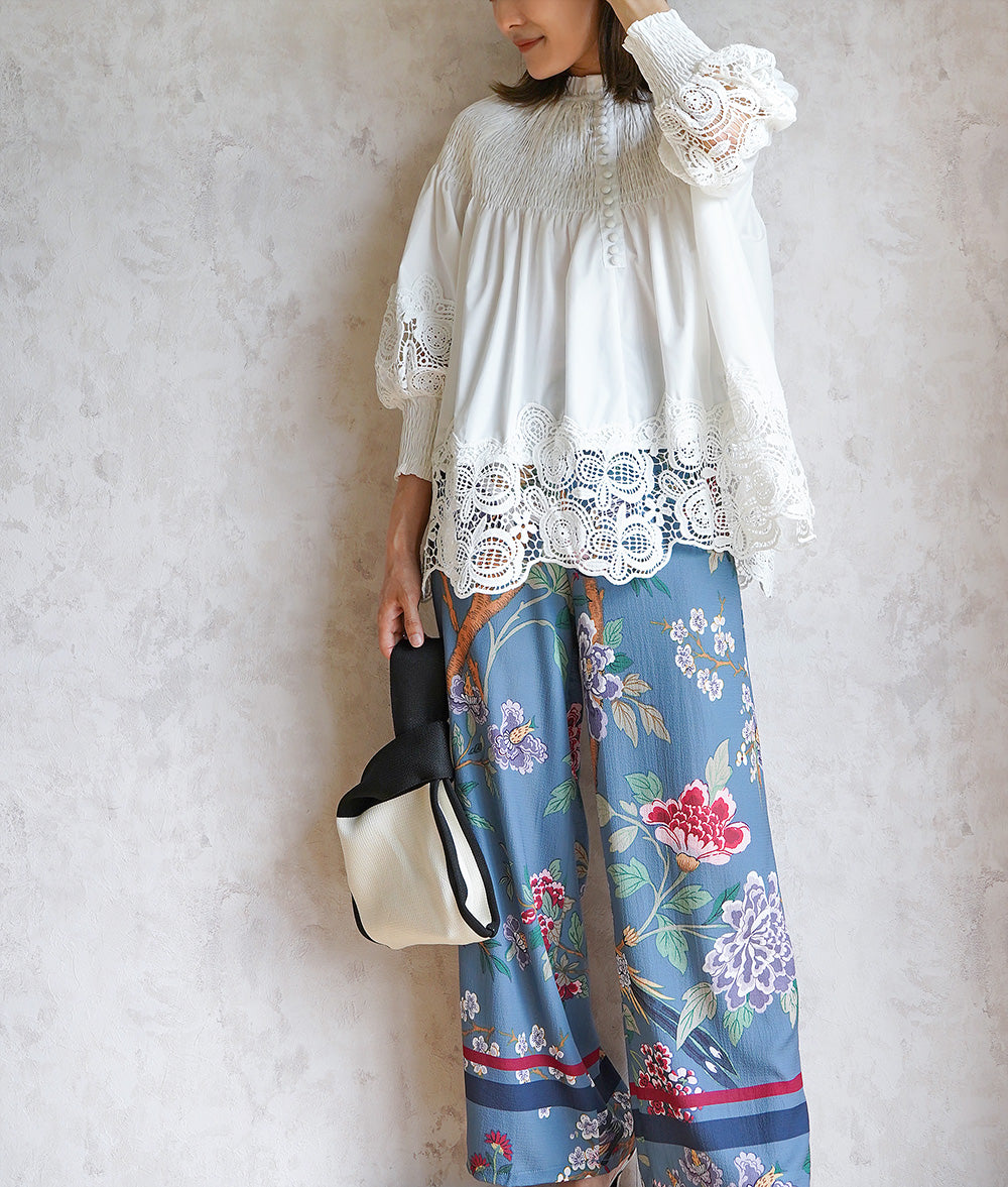 Floral lace and ruched blouse