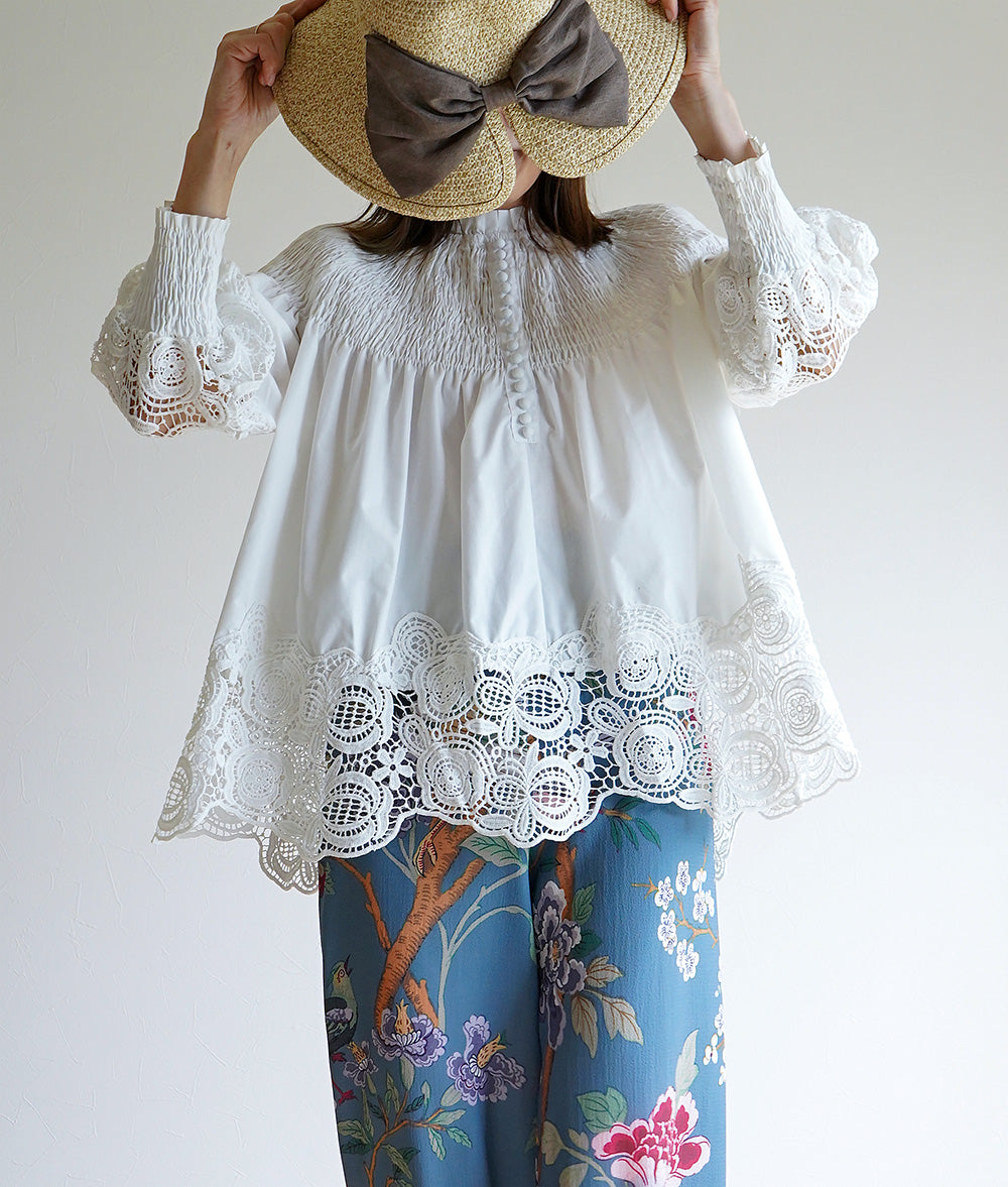 Floral lace and ruched blouse