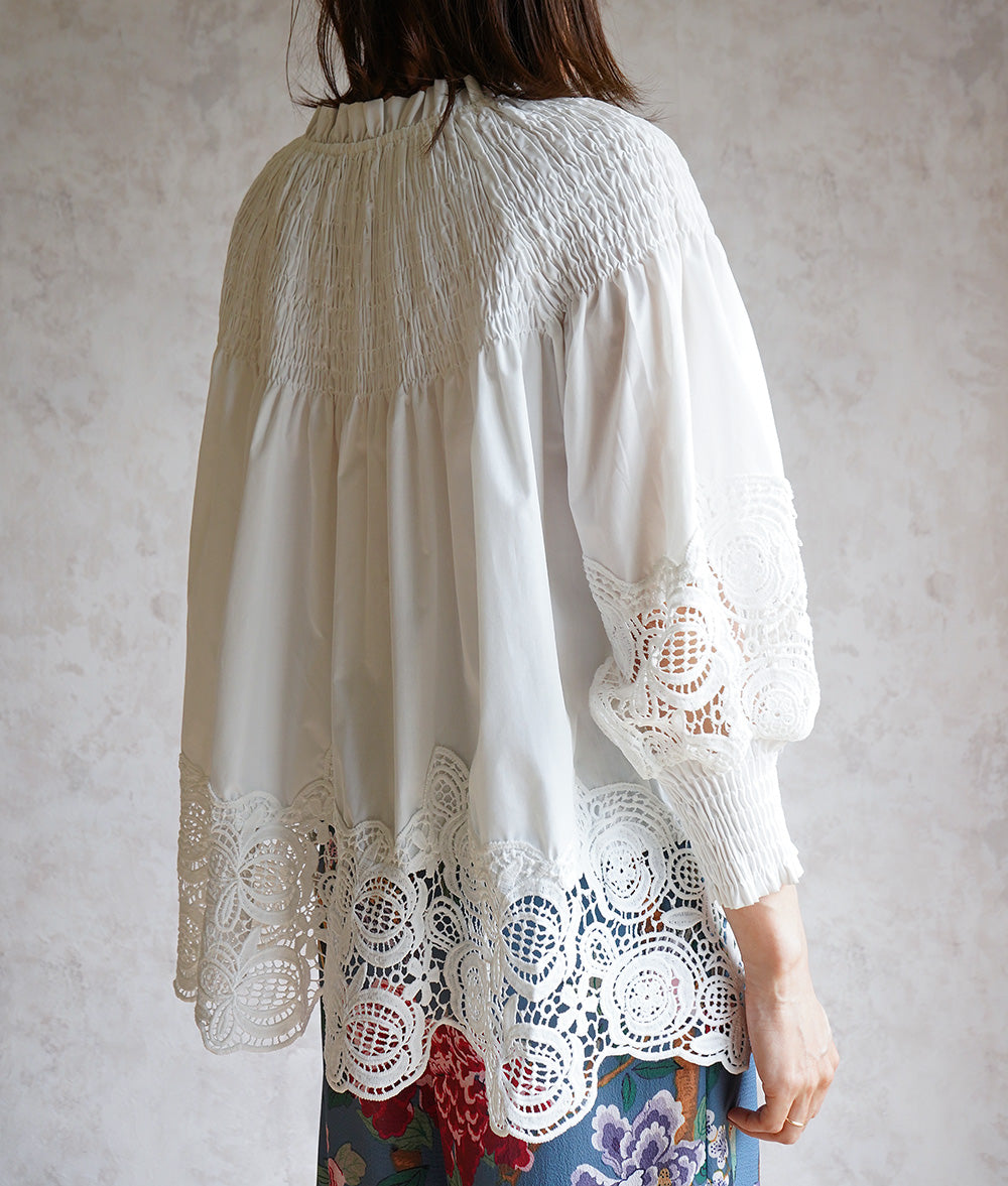 Floral lace and ruched blouse
