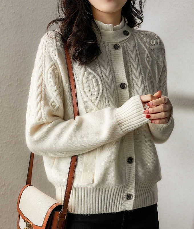 Cable knit cardigan with collar tab