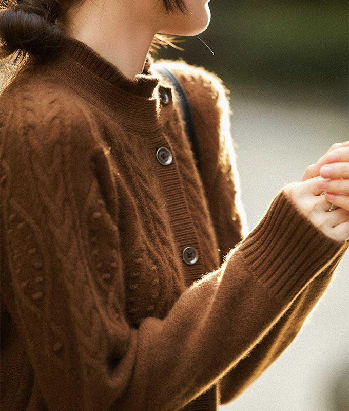 Cable knit cardigan with collar tab
