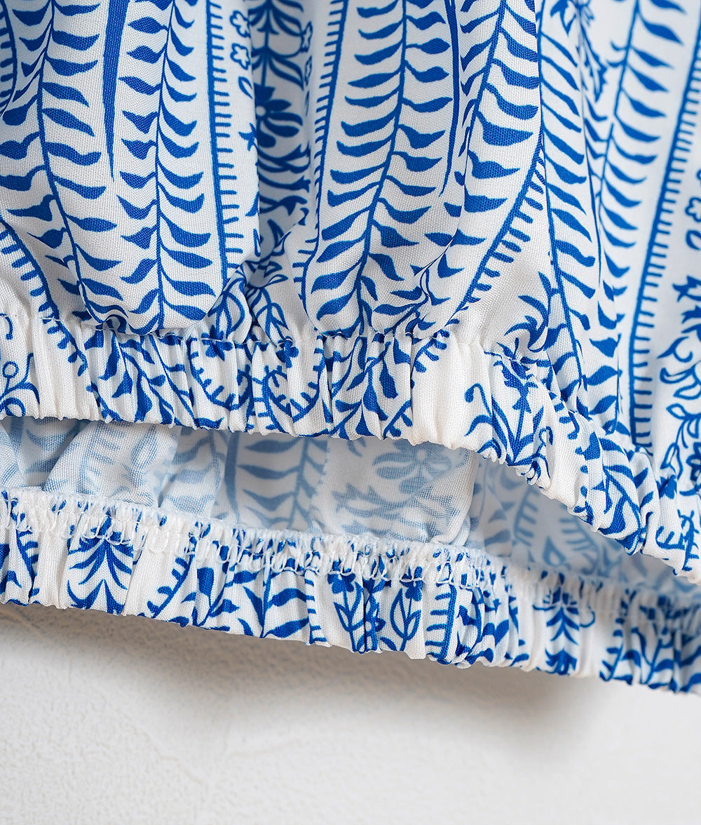 Blouse with ribbon and paisley pattern