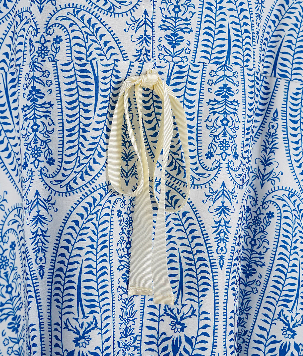 Blouse with ribbon and paisley pattern