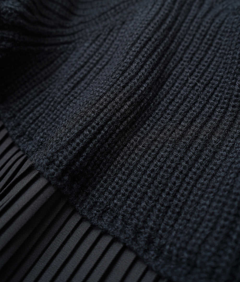Dramatic pleated high neck knit