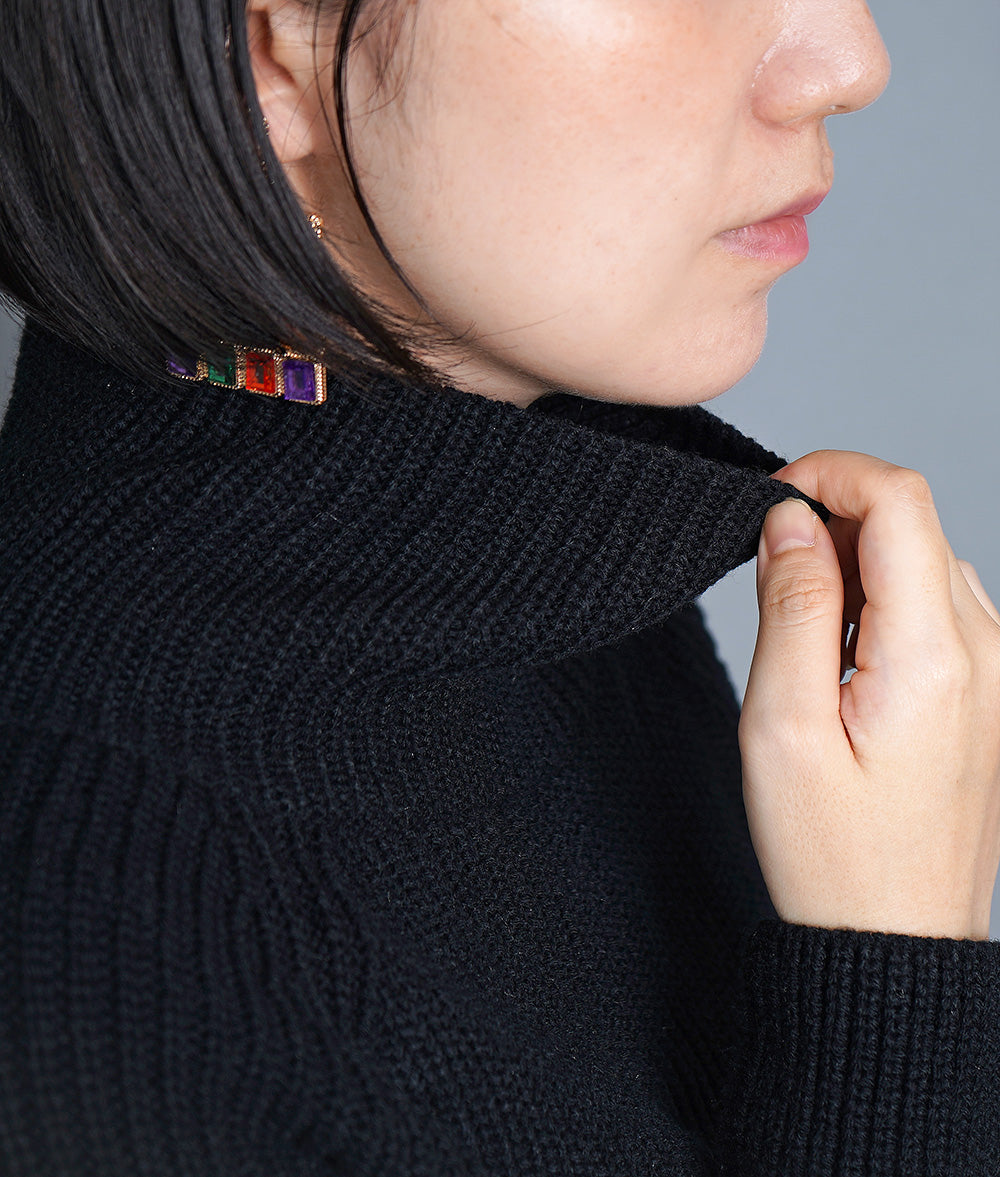 Dramatic pleated high neck knit