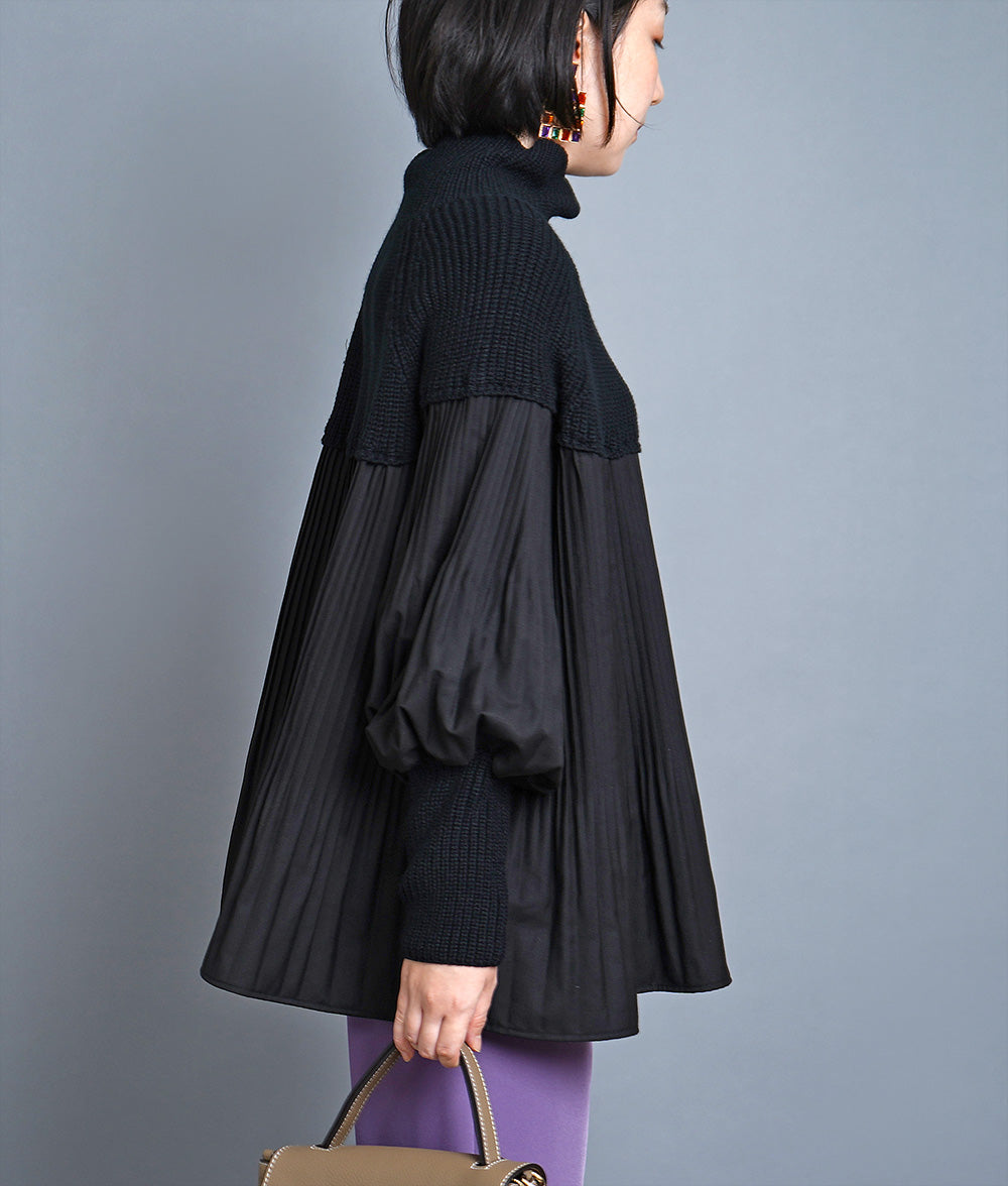 Dramatic pleated high neck knit