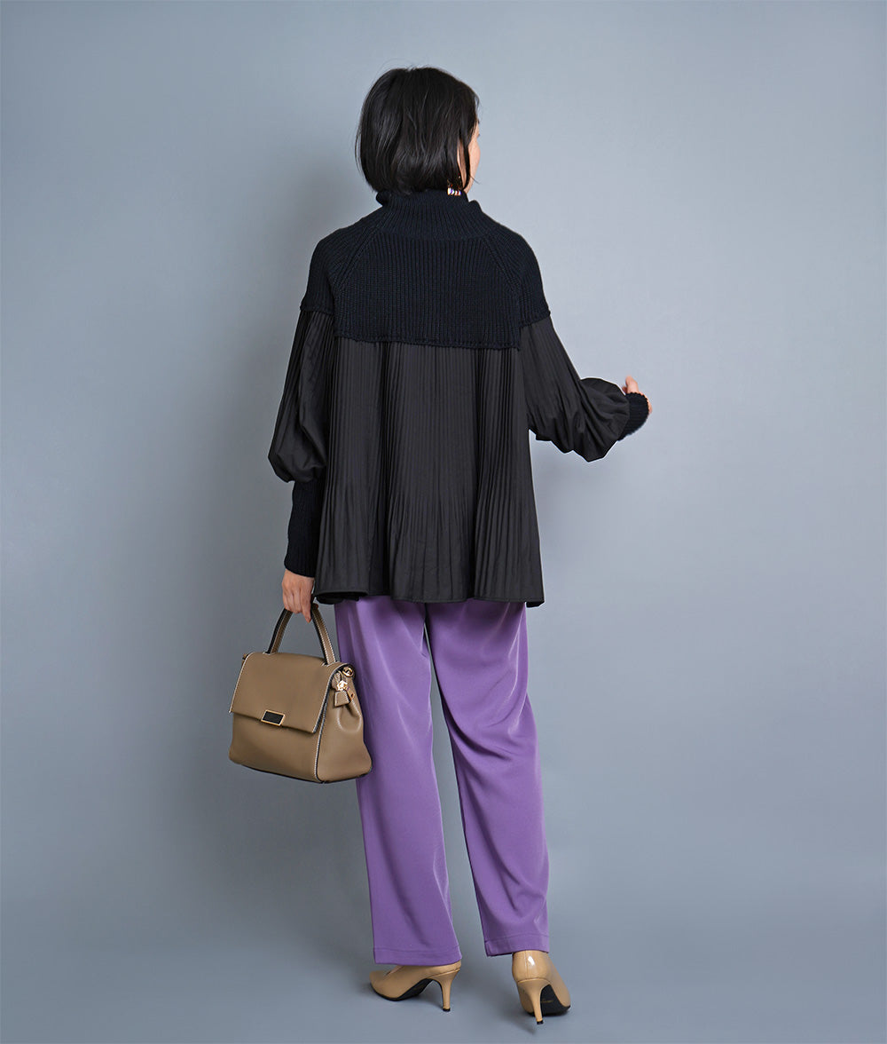 Dramatic pleated high neck knit