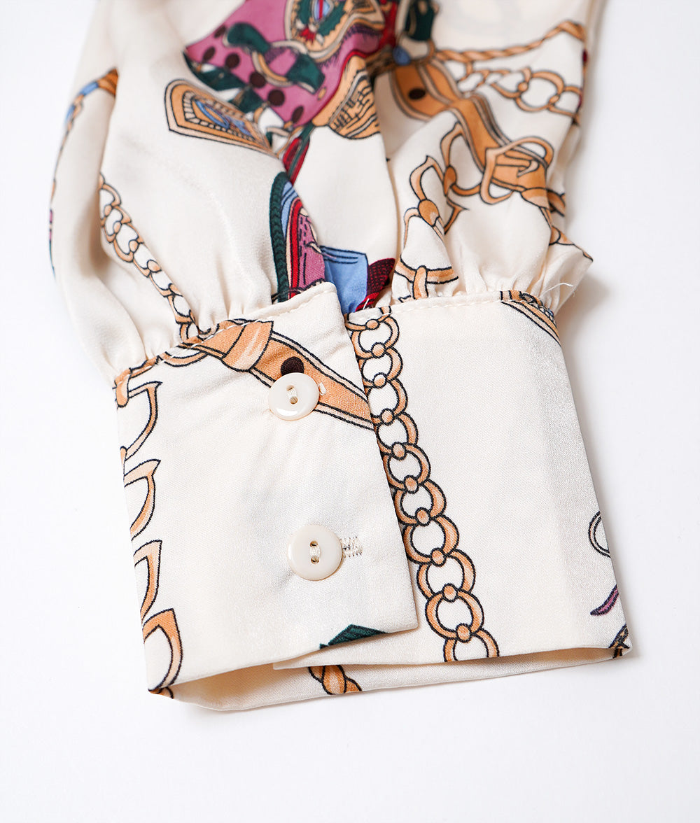 Chain pattern bow tie blouse