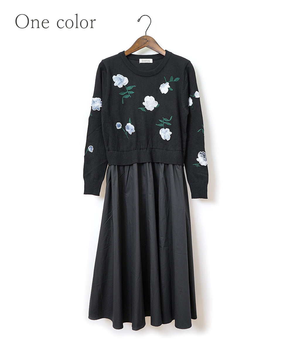 Black one-piece dress with lovely fragile flowers and embroidered flowers