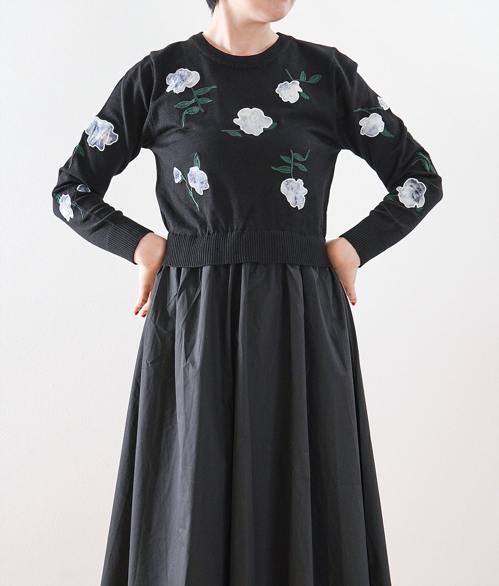 Black one-piece dress with lovely fragile flowers and embroidered flowers