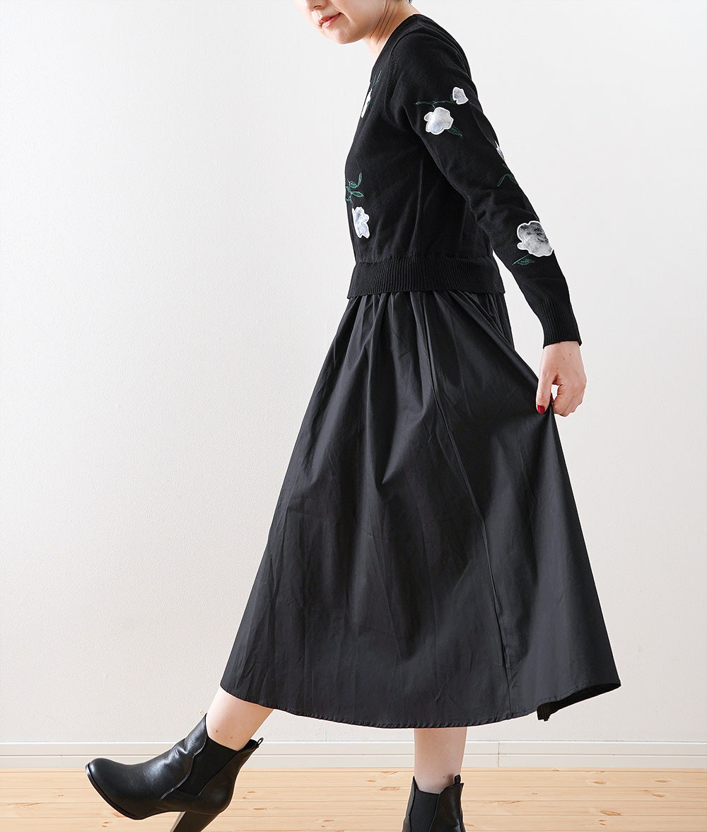 Black one-piece dress with lovely fragile flowers and embroidered flowers
