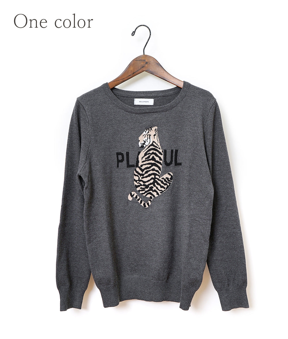 Jacquard knit of the tiger that a back figure shines in