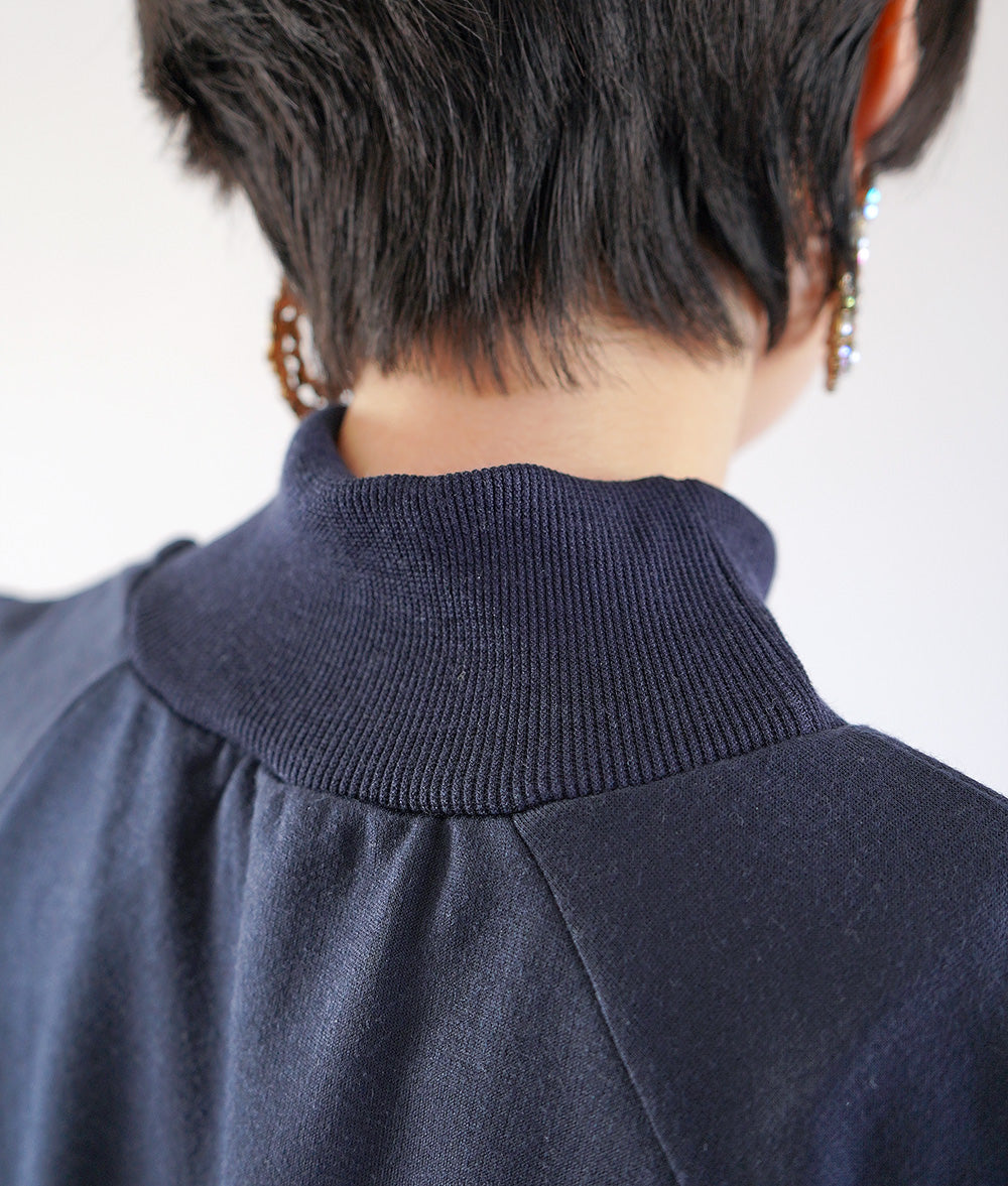 Layered cut and sew with wavy sleeves