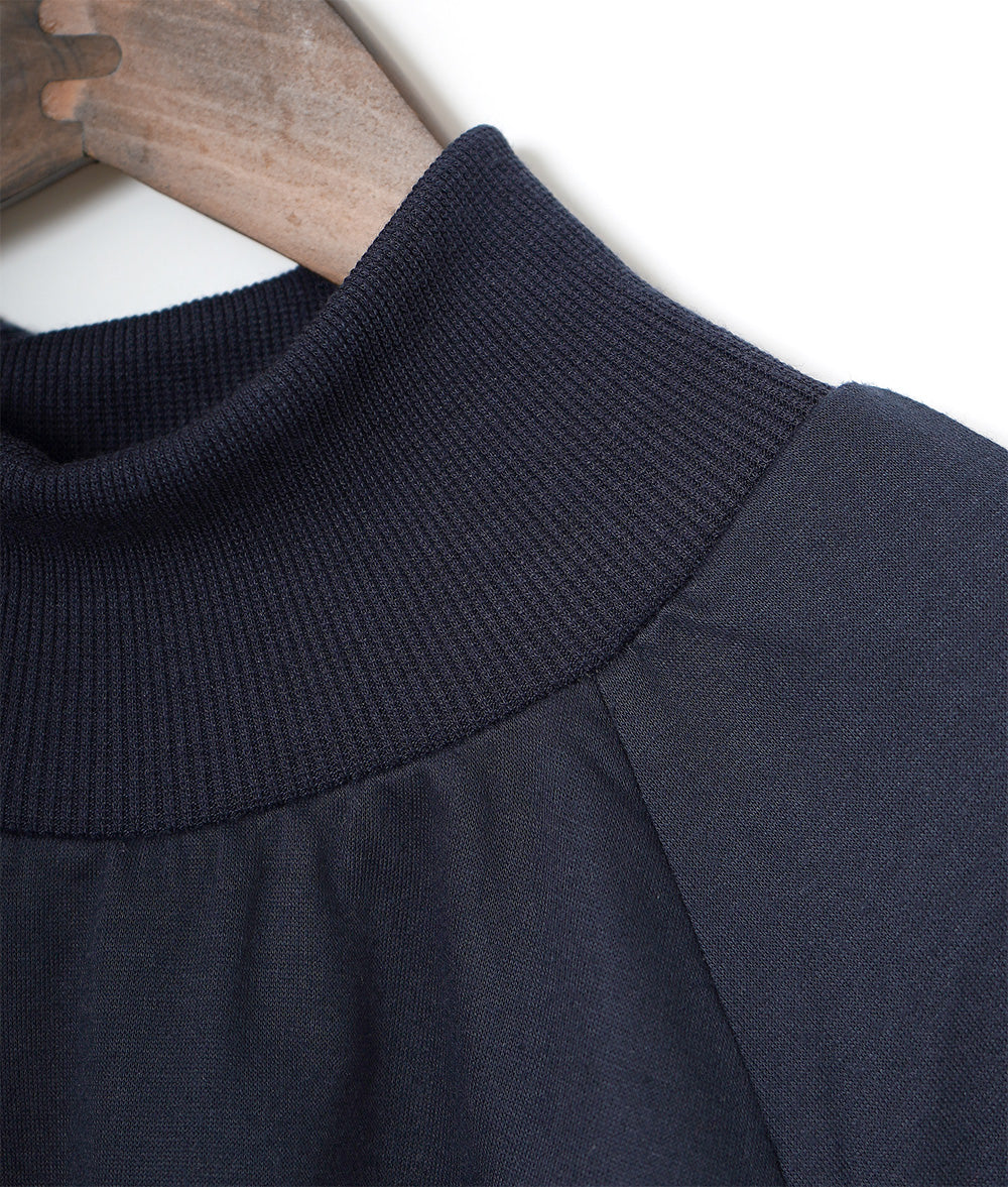 Layered cut and sew with wavy sleeves