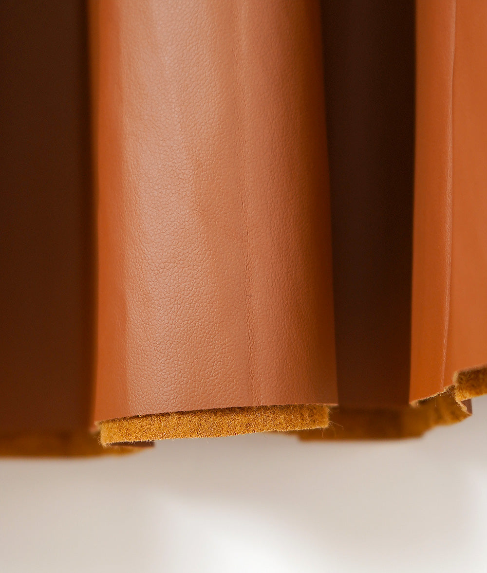 Camel colored eco-leather pleated skirt