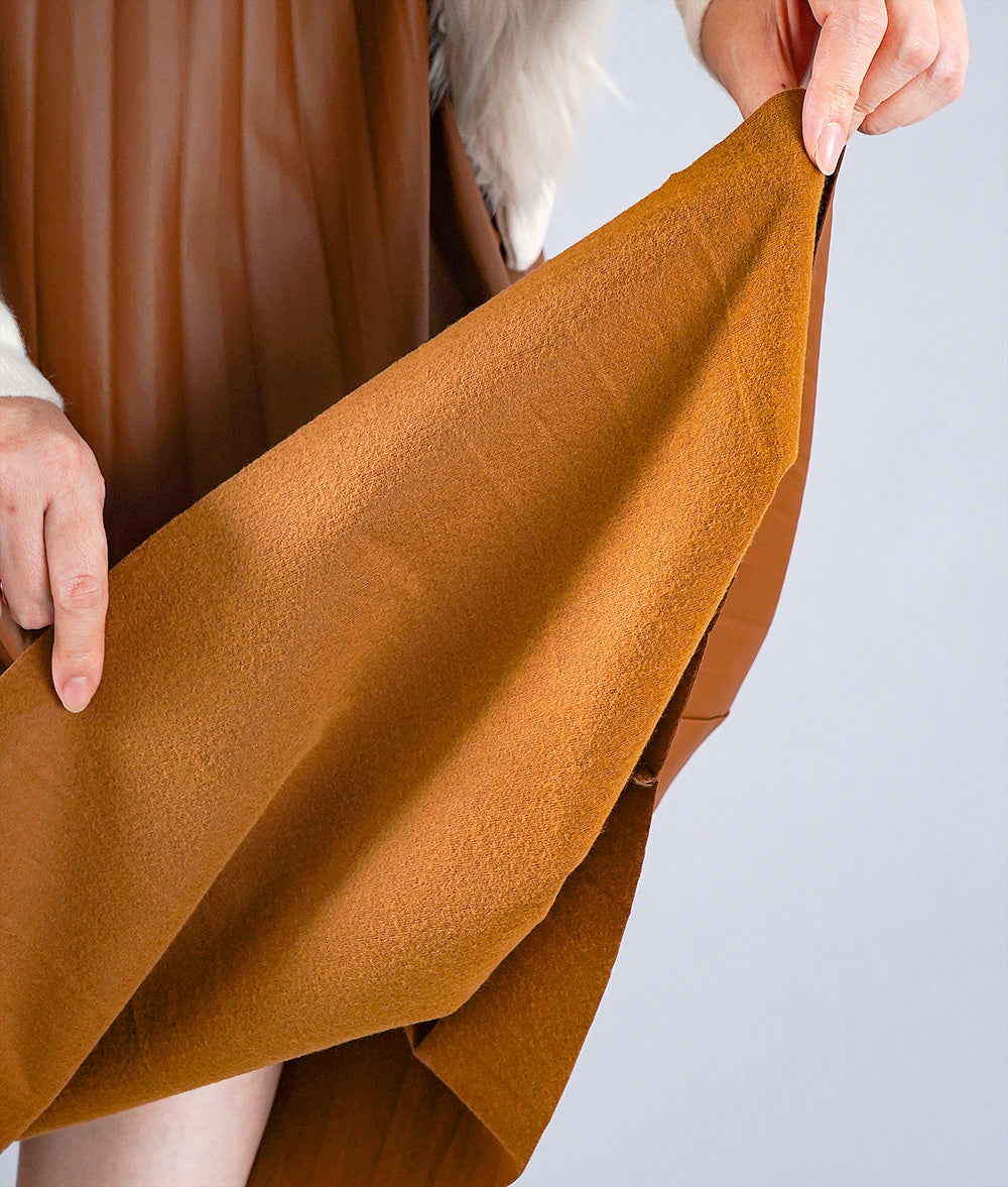 Camel colored eco-leather pleated skirt
