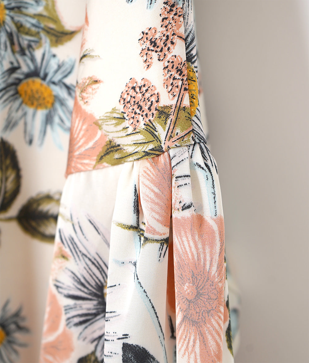 A soft, thick blouse with a simple flower that gently shines