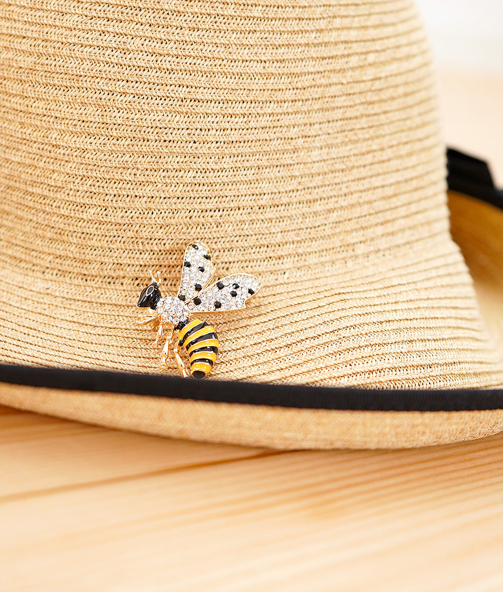 Eye-catching twinkling bee brooch