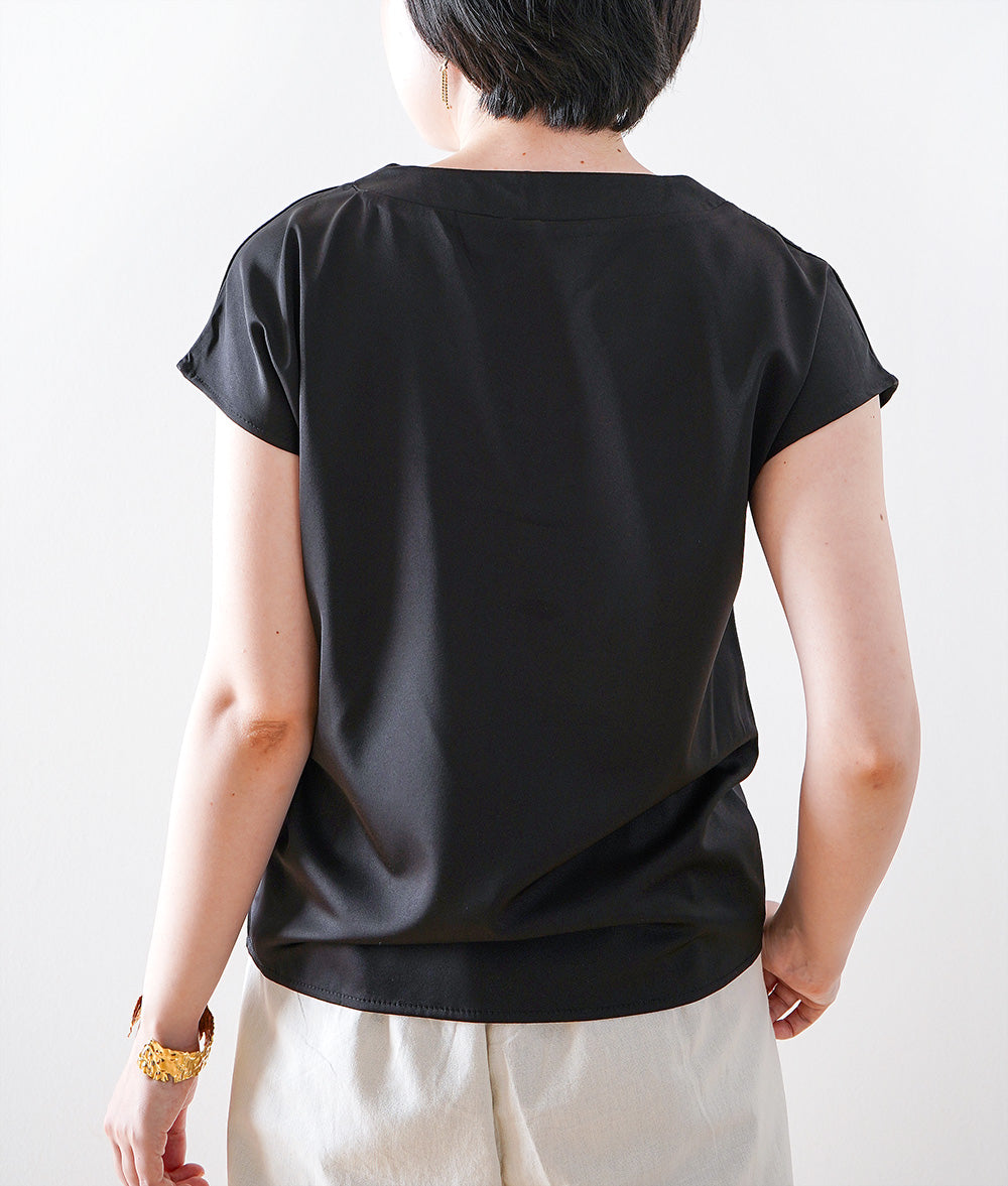 Glossy blouse with embroidery and cross lines