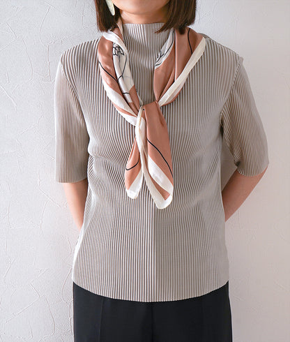 Pleated blouse and artistic satin scarf