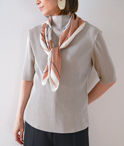 Pleated blouse and artistic satin scarf