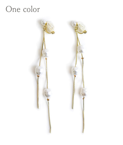 Dangling pearl earrings