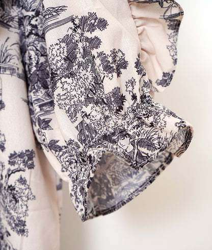 Landscape pattern blouse with plenty of frills