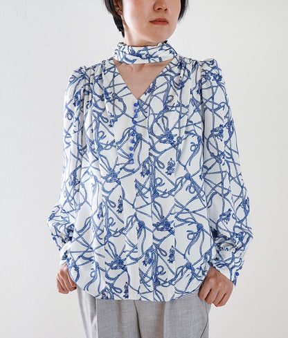 Rope-patterned puffy-sleeve blouse