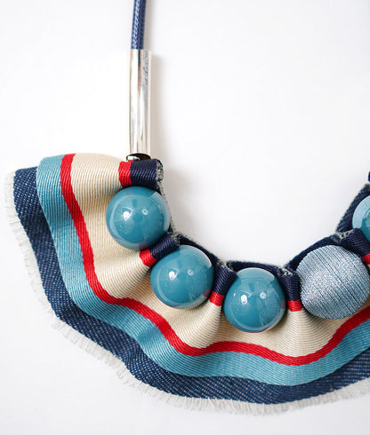 Ball and denim necklace