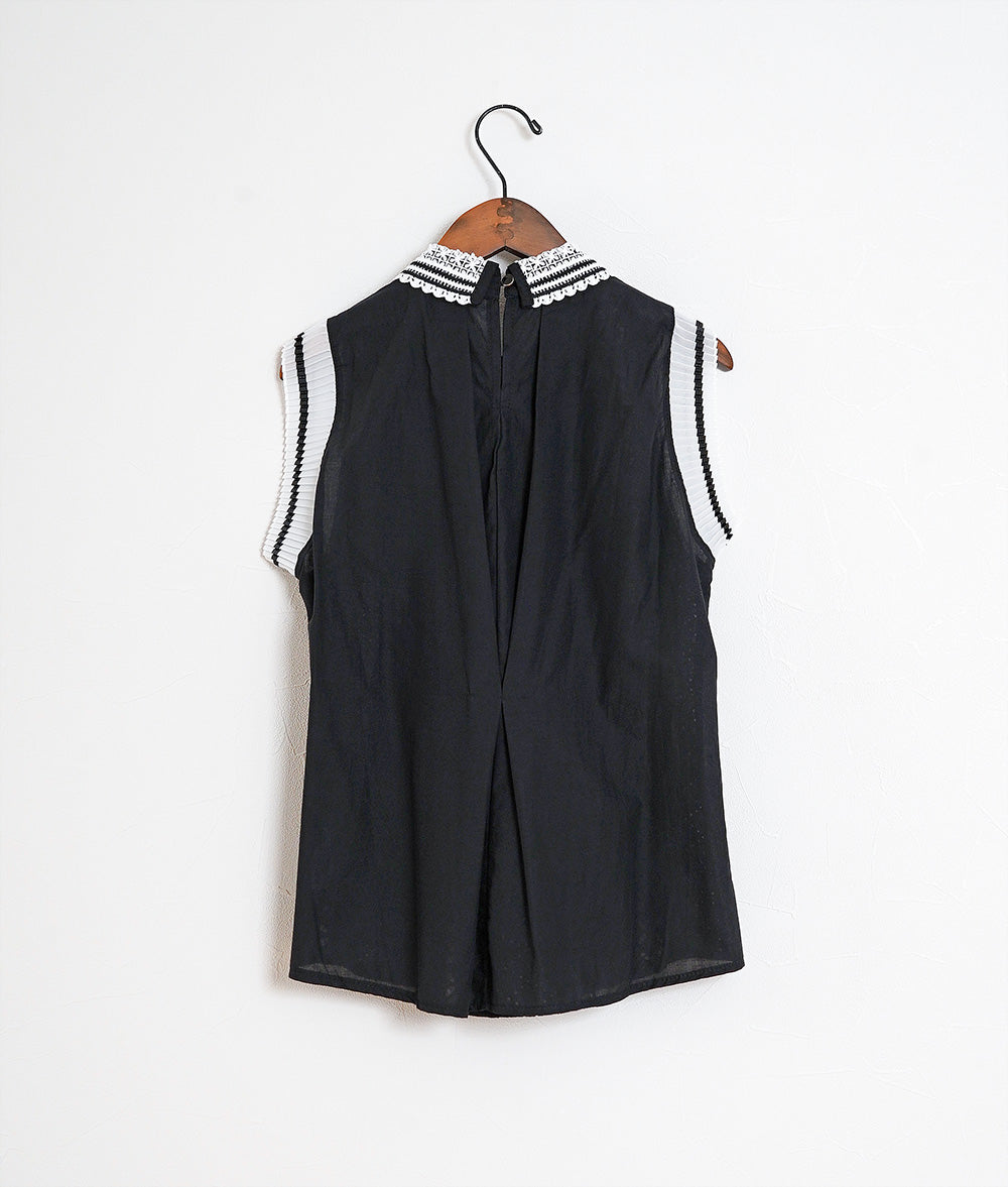 Sleeveless shirt with cutwork lace