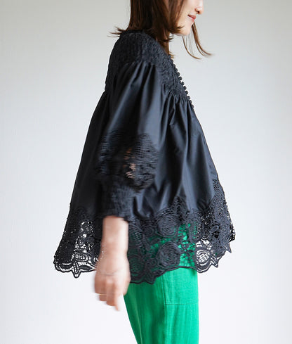 Floral lace and ruched blouse