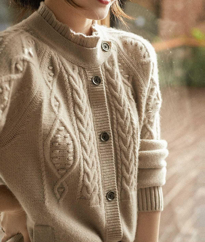 Cable knit cardigan with collar tab