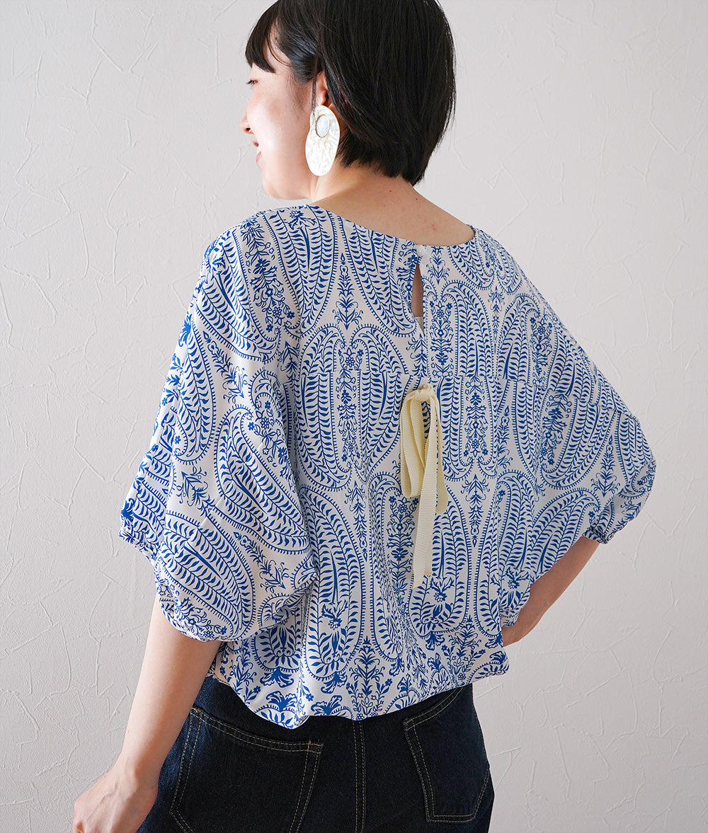 Blouse with ribbon and paisley pattern