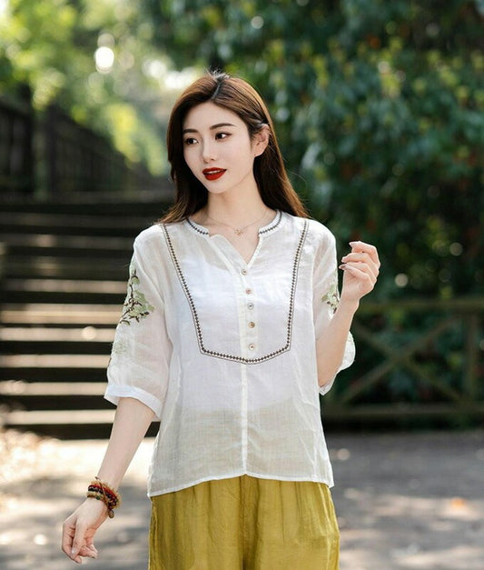 Sheer cotton blouse with flower embroidery